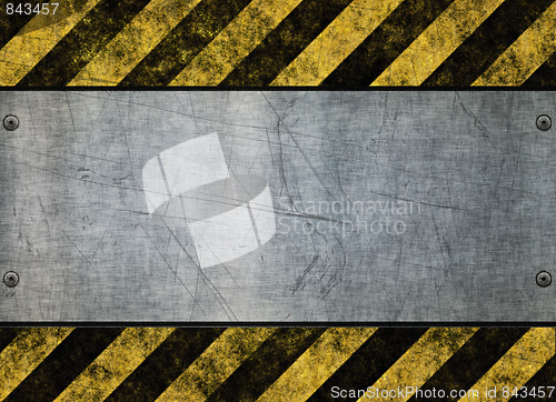 Image of grungy hazard sign metal plate