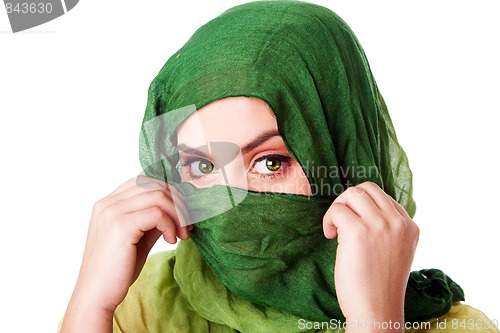 Image of Face with green eyes and scarf