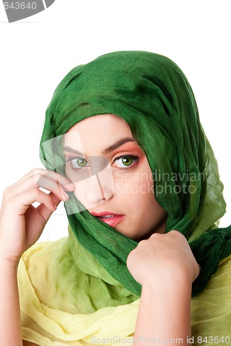 Image of Face with green eyes and scarf