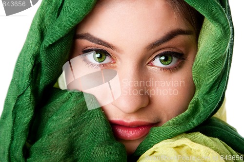 Image of Face with green eyes and scarf