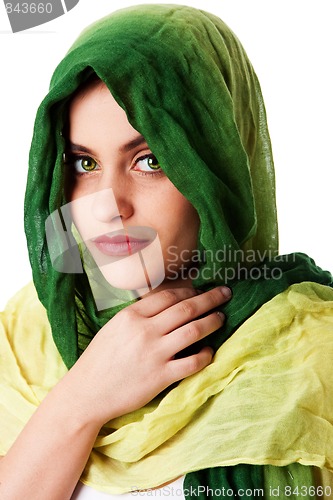 Image of Face with green eyes and scarf