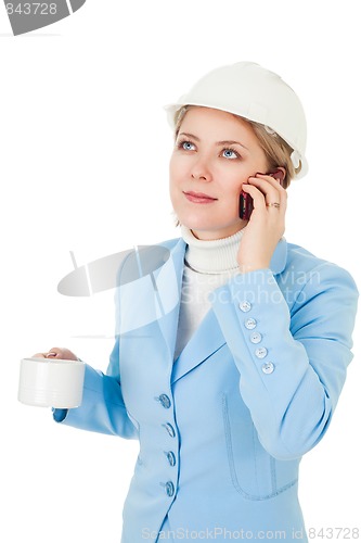 Image of architect woman calling by phone