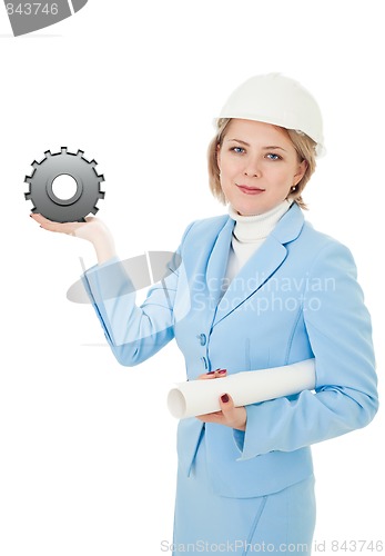 Image of Engineer holding gear
