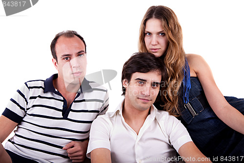 Image of Two men and a woman sitting on the couch