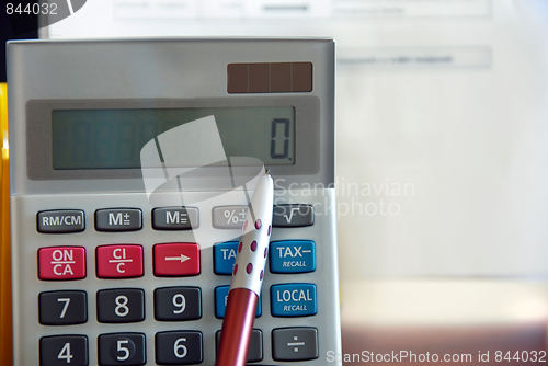 Image of Calculator and pen