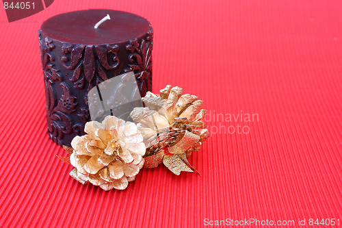 Image of Candle and Pine Cones