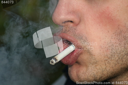 Image of Person Smoking a Cigarette