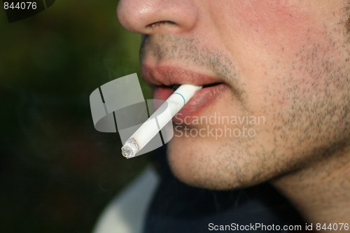 Image of Person Smoking a Cigarette