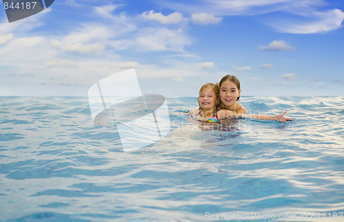 Image of sisters in the sea