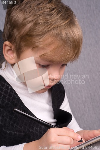 Image of Boy writing