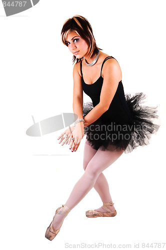 Image of A young beautiful ballerina dancing.