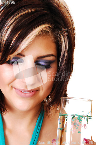 Image of Young woman with a glass of water.