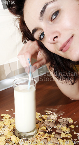 Image of Young people eating milk with cereals