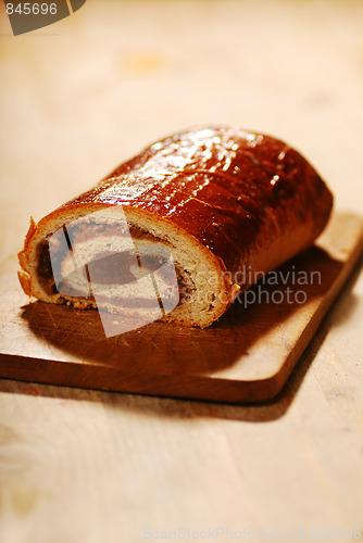 Image of still life of poppy bread loaf