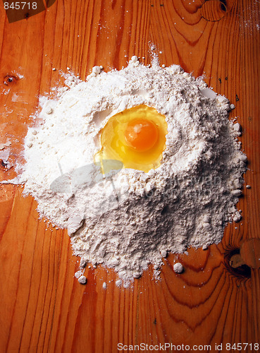 Image of egg with flour