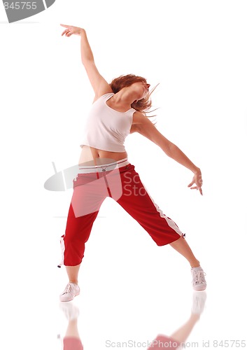 Image of attractive teenage dancing over white background