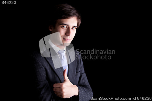 Image of Young Business Man with thumb raised