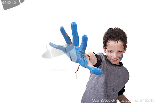 Image of hand hint of blue, with the kid blurred