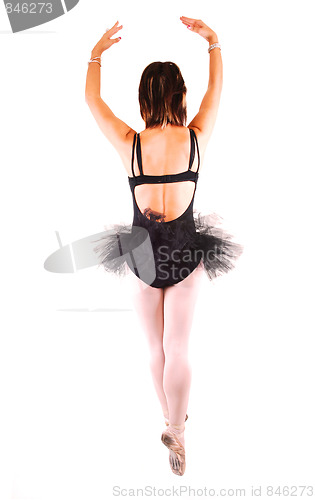 Image of A young beautiful ballerina dancing.