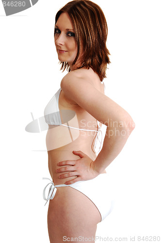 Image of Pretty young girl in a white bikini.