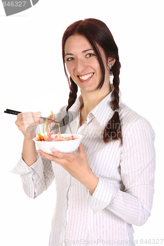 Image of Beautiful woman eating with chopsticks