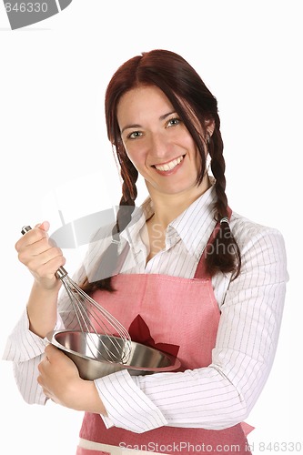 Image of beautiful housewife preparing with egg beater 