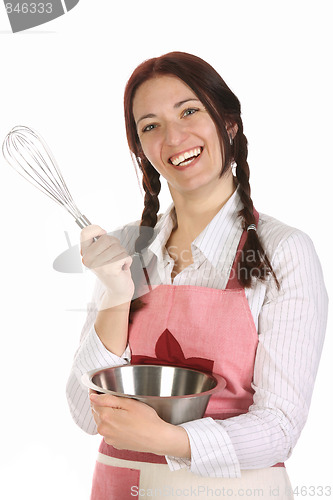 Image of beautiful housewife preparing with egg beater 