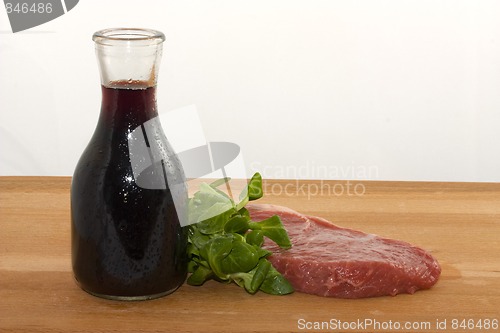 Image of Raw beef and wine