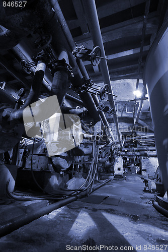 Image of different size and shaped pipes at a power plant