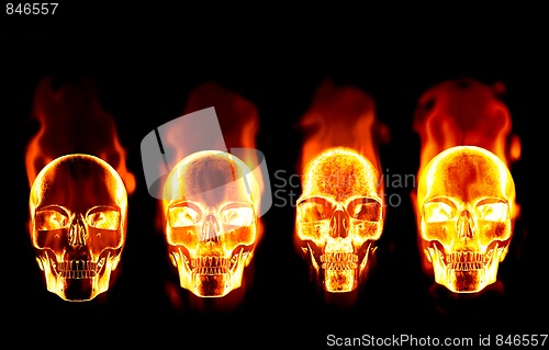 Image of four flaming skulls on black