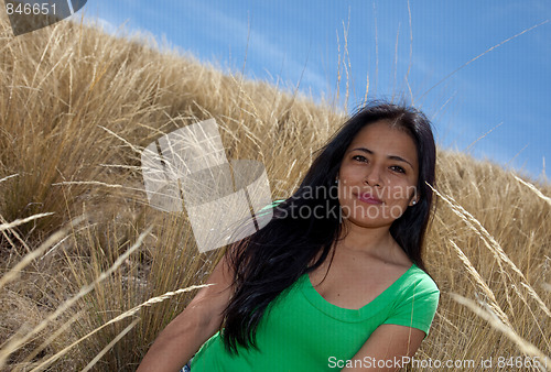 Image of Latin Woman in Grass