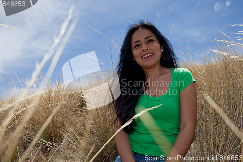 Image of Latin Woman in Grass