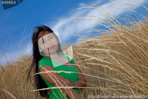 Image of Latin Woman in Grass