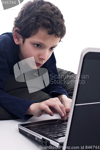 Image of teen playing computer