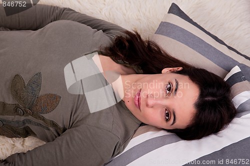 Image of beautiful woman lying