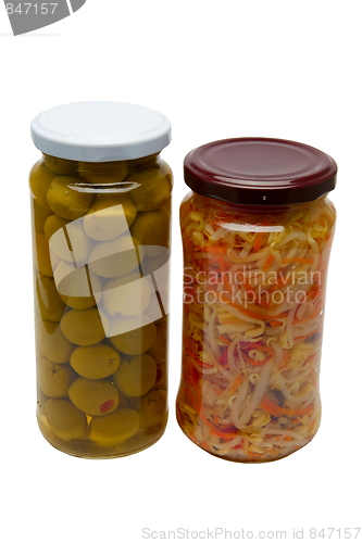 Image of Glass jars with marinated vegetables  isolated on the white back