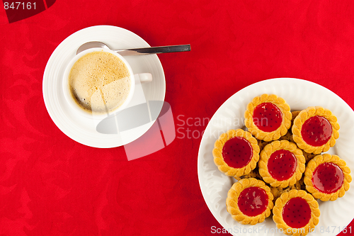 Image of Coffee and cookies on a red background