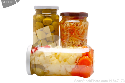 Image of Glass jars with marinated vegetables  isolated on the white back