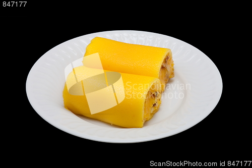 Image of Cake in a plate isolated on the black