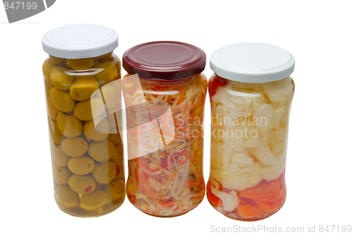 Image of Glass jars with marinated vegetables  isolated on the white back