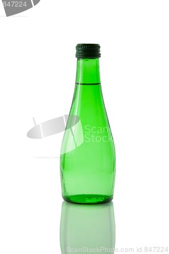 Image of A bottle of mineral water reflected on white background