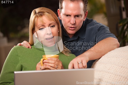 Image of Handsome Couple Using Laptop