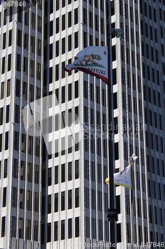 Image of Skyscrapers and a flag of California