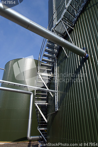 Image of Ladders and pipes On An industrial construction Site