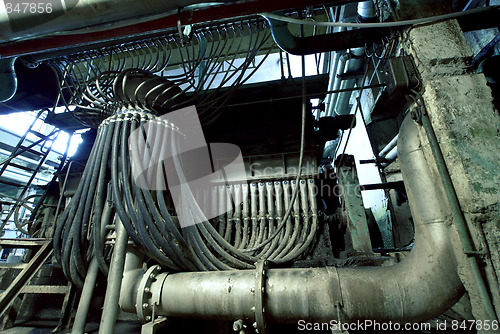 Image of different size and shaped pipes at a power plant