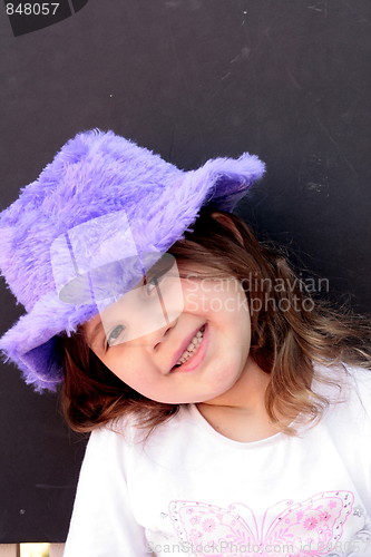 Image of Pretty girl in purple hat