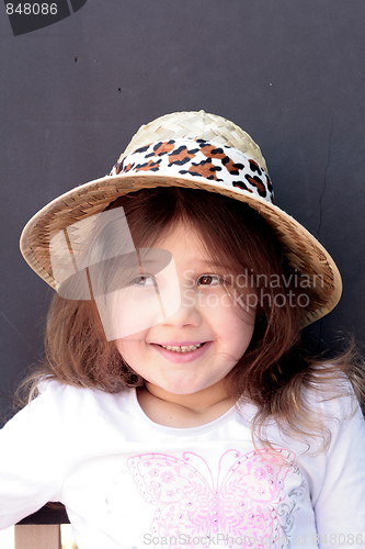 Image of Young girl in big brimmed hat