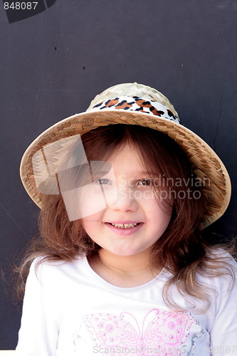 Image of Young girl in big brimmed hat