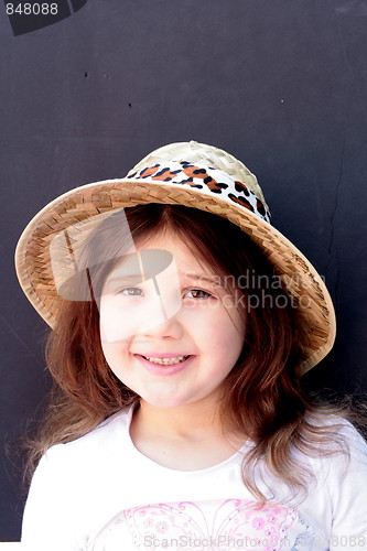 Image of Young girl in big brimmed hat