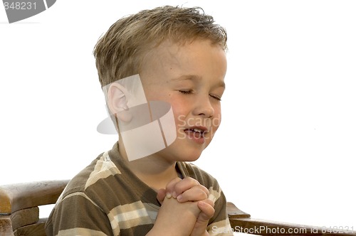 Image of Little boy praying